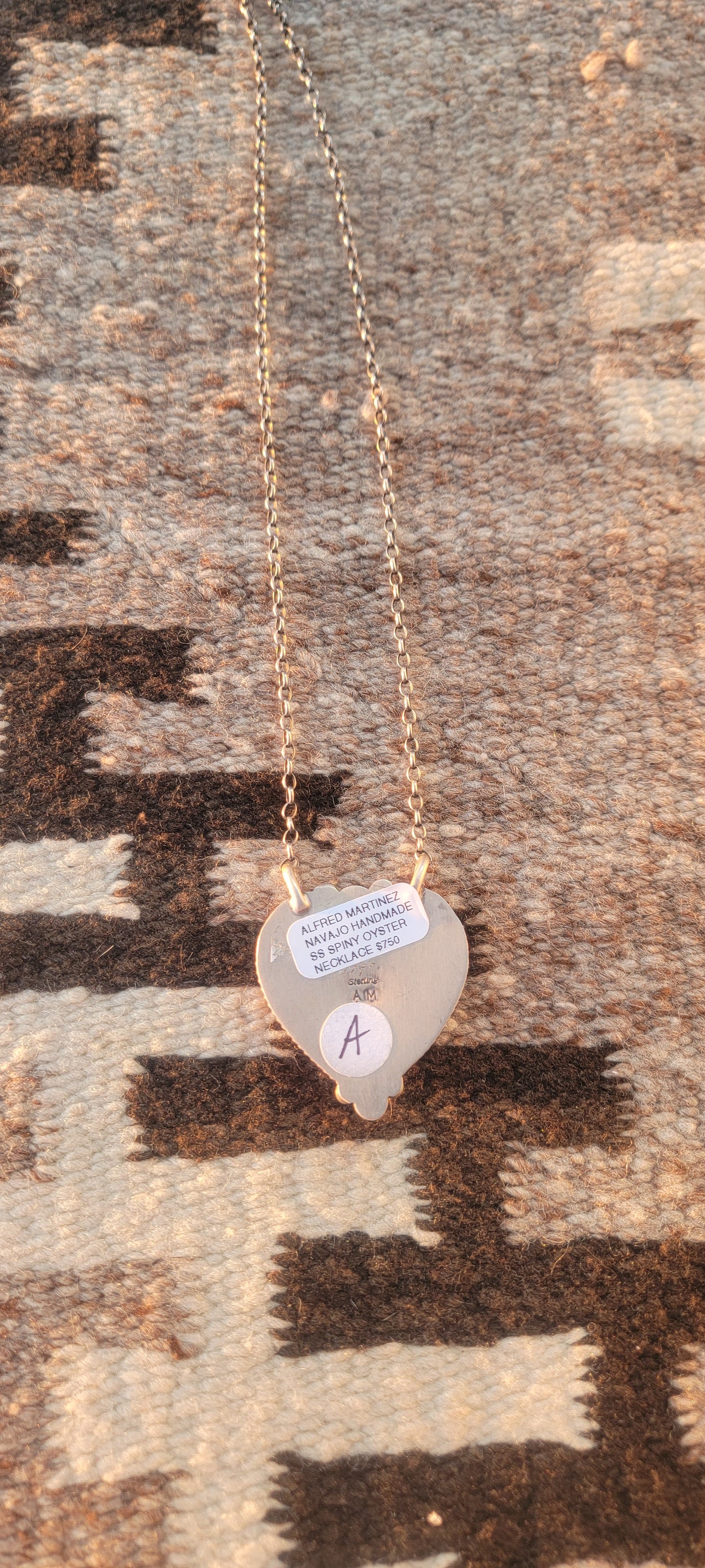 Heart shaped pendant spiny oyster shell