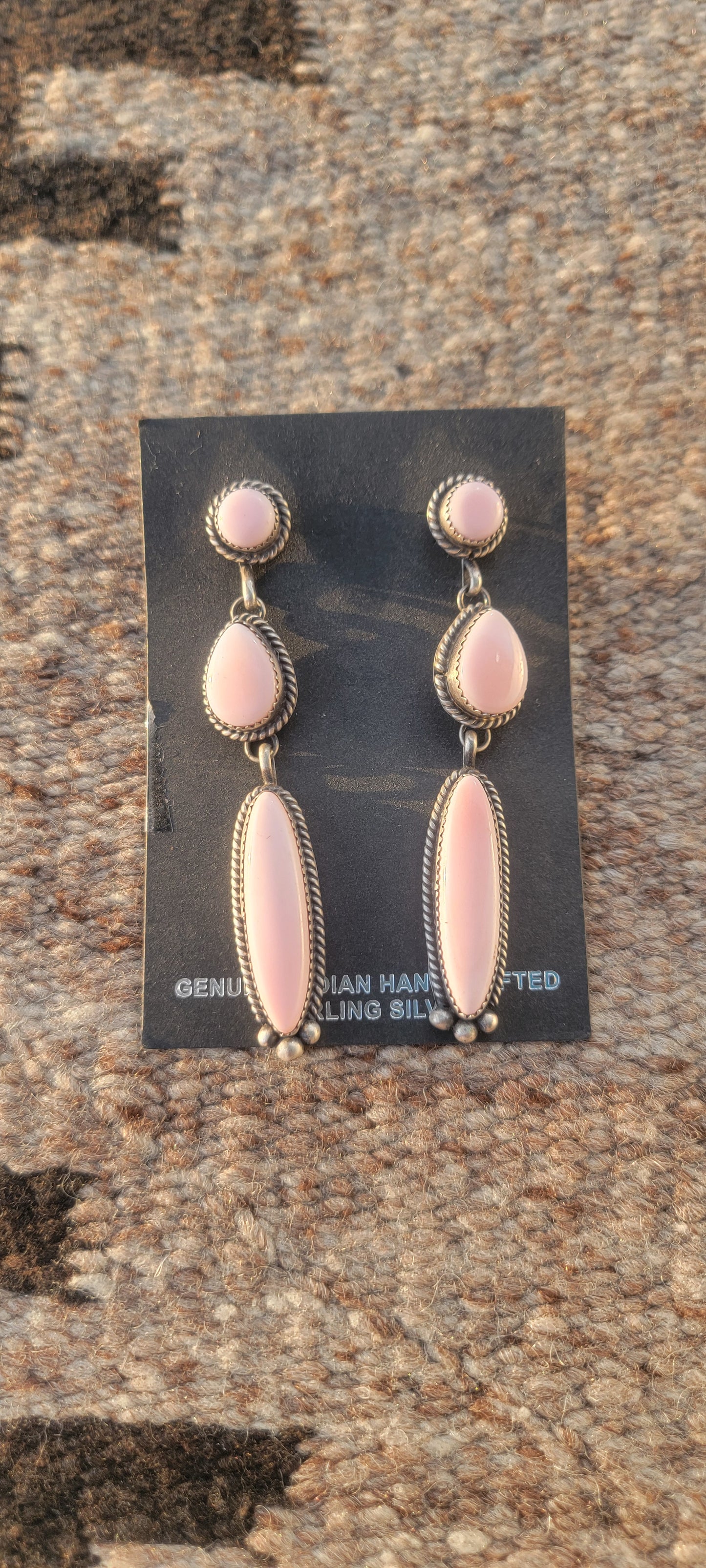 Conch pink shell earrings set in sterling silver